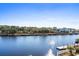 Scenic waterfront view with a private dock and lush greenery at 4445 Kingsport Rd. # 303, Little River, SC 29566
