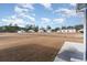 View of the backyard and neighboring houses at 509 Covewood Ct., Longs, SC 29568