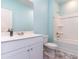 Bathroom with a white vanity, toilet, and a combination bathtub and shower at 509 Covewood Ct., Longs, SC 29568