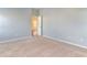 Empty bedroom with light gray walls and neutral carpeting at 509 Covewood Ct., Longs, SC 29568