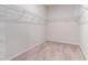 Spacious, empty walk-in closet with wire shelving at 509 Covewood Ct., Longs, SC 29568