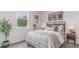 Cozy bedroom with a comfortable bed, stylish decor, and a large window at 527 Firouz Dr, Longs, SC 29568
