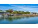 Scenic waterfront view featuring restaurants, shops, and docks along a serene river at 547 Slaty Dr., Myrtle Beach, SC 29588