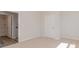 Cozy bedroom with carpeted floors and adjacent bathroom access at 620 Grateful Dr., Little River, SC 29566