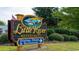 Little River Waterfront sign with dining, shops, and recreation at 620 Grateful Dr., Little River, SC 29566
