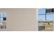 Bright living room with large windows offering views of the community at 620 Grateful Dr., Little River, SC 29566