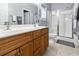 Modern bathroom featuring double sinks, a glass shower, and updated fixtures at 785 Rambler Ct., Myrtle Beach, SC 29579