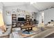 Living room with gray sectional, built-in bookshelves, and a TV at 785 Rambler Ct., Myrtle Beach, SC 29579
