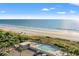 An aerial view of the beach, pool, and surrounding area of the condo at 9820 Queensway Blvd. # 903, Myrtle Beach, SC 29572
