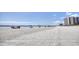 Sandy beach with pier and high-rise buildings at 9820 Queensway Blvd. # 903, Myrtle Beach, SC 29572