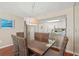 Dining area with seating for six and adjacent kitchen at 9820 Queensway Blvd. # 903, Myrtle Beach, SC 29572