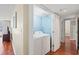 Convenient in-unit laundry room with stacked washer and dryer at 9820 Queensway Blvd. # 903, Myrtle Beach, SC 29572