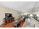 Living and dining area with wood floors and neutral-toned walls at 9820 Queensway Blvd. # 903, Myrtle Beach, SC 29572