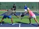 Residents enjoying the community pickleball court at 1230 Crested Iris Way, North Myrtle Beach, SC 29582