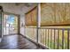 Private balcony with wooden flooring and wooded views at 1286 River Oaks Dr. # 8-M, Myrtle Beach, SC 29579