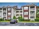 Attractive three-story building with ample parking at 1286 River Oaks Dr. # 8-M, Myrtle Beach, SC 29579