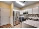 Modern kitchen with stainless steel appliances at 1286 River Oaks Dr. # 8-M, Myrtle Beach, SC 29579