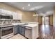 Updated kitchen with stainless steel appliances and breakfast bar at 1286 River Oaks Dr. # 8-M, Myrtle Beach, SC 29579