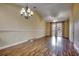 Spacious living room with hardwood floors and access to balcony at 1286 River Oaks Dr. # 8-M, Myrtle Beach, SC 29579