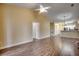 Open living room with hardwood floors and kitchen view at 1286 River Oaks Dr. # 8-M, Myrtle Beach, SC 29579