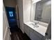 Bathroom vanity with white quartz countertop, sink, and mirror at 166 Linares St., Loris, SC 29569