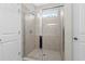 Walk in shower with frameless glass door and tile surround at 1711 Sapphire Dr., Longs, SC 29568