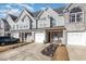 Attractive two-story home with gray siding, brick accents, and a covered entryway at 305 Rung Rd. # 5, Myrtle Beach, SC 29588