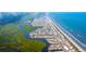 Coastal community with houses, beach, and waterway at 3413 Cove Side Ct., North Myrtle Beach, SC 29582