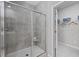 Modern shower with tiled walls and glass door at 3413 Cove Side Ct., North Myrtle Beach, SC 29582