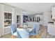 Bright, open kitchen with modern appliances, island, and dining area at 3413 Cove Side Ct., North Myrtle Beach, SC 29582