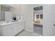 Main bathroom featuring a double vanity and view of the bedroom at 3413 Cove Side Ct., North Myrtle Beach, SC 29582
