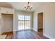 Dining area with sliding glass doors leading to the backyard at 3427 B And S Rd., Loris, SC 29569