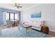 Coastal living room with white couch, dining area, and ocean view at 4103 N Ocean Blvd. # 905, North Myrtle Beach, SC 29582