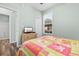 Third bedroom with colorful bedding and view of the bathroom at 476 River Oaks Dr. # 64E, Myrtle Beach, SC 29579