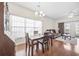 Dining area with wooden table and chairs, and a comfortable couch at 4924 Pond Shoals Ct. # 101, Myrtle Beach, SC 29579