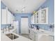 Bright kitchen featuring white cabinets, light countertops, and stainless steel appliances at 4924 Pond Shoals Ct. # 101, Myrtle Beach, SC 29579