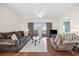 Comfortable living room with access to a private balcony or patio at 4924 Pond Shoals Ct. # 101, Myrtle Beach, SC 29579