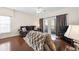 Inviting living area featuring brown couch, matching recliner, and patio access at 4924 Pond Shoals Ct. # 101, Myrtle Beach, SC 29579