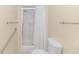 Bathroom featuring a walk-in shower, toilet, and grab bars for added accessibility at 5080 Forest Dr., Loris, SC 29569