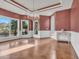 Sunlit dining room with hardwood floors and views at 6009 Fish Hawk Ct., Myrtle Beach, SC 29579