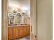 Elegant bathroom with double vanity, large mirror, and stylish light fixtures at 604 Stableford Ct., Myrtle Beach, SC 29577