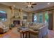 Inviting living room with fireplace, comfortable seating, and patio access at 604 Stableford Ct., Myrtle Beach, SC 29577