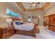 Spacious bedroom with wooden furniture and an attached bathroom at 604 Stableford Ct., Myrtle Beach, SC 29577