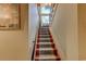 Staircase with decorative carpet runner leading to the second floor at 604 Stableford Ct., Myrtle Beach, SC 29577