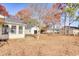 Backyard with detached shed and trees with fall foliage at 978 Castlewood Dr., Conway, SC 29526