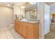 Bathroom with double vanity sinks, granite countertops, and a walk-in shower at 9994 Beach Club Dr. # 1604, Myrtle Beach, SC 29572