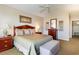 Spacious bedroom with a comfortable king-size bed, ceiling fan, and ample storage at 9994 Beach Club Dr. # 1604, Myrtle Beach, SC 29572