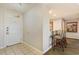 Condo entryway with white door, breakfast bar, and tiled floor at 9994 Beach Club Dr. # 1604, Myrtle Beach, SC 29572