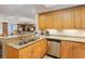 Kitchen with light wood cabinets, granite countertops, and stainless steel appliances at 9994 Beach Club Dr. # 1604, Myrtle Beach, SC 29572