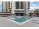 Triangular pool with a diving board and ample deck space at 9994 Beach Club Dr. # 1604, Myrtle Beach, SC 29572